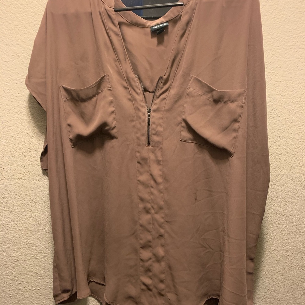 Torrid shirt contains minor stain below pocket